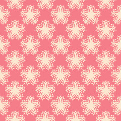Seamless floral pattern. Beige print on pink background