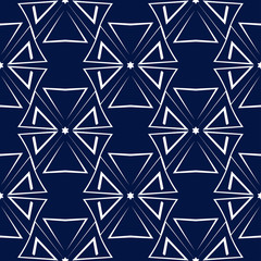Geometric seamless design. White triangle pattern on dark blue background