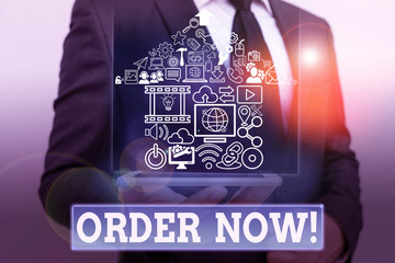 Writing note showing Order Now. Business concept for confirmed request by one party to another to...