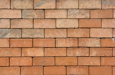 Brick wall , Brick is a popular medium for constructing buildings