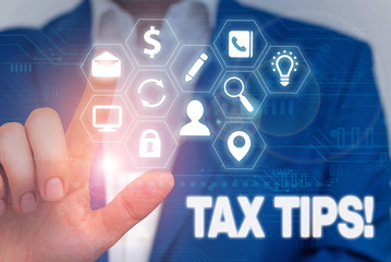 Handwriting text writing Tax Tips. Conceptual photo compulsory contribution to state revenue levied by government