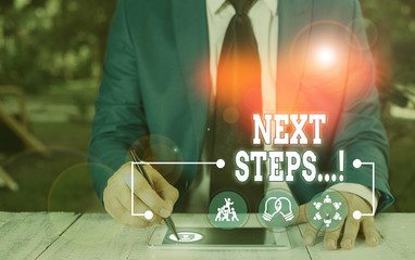 Conceptual hand writing showing Next Steps. Concept meaning something you do after you have...