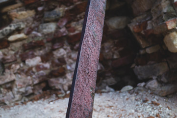 Fototapeta premium Iron armature in destroyed building. abandoned ruins