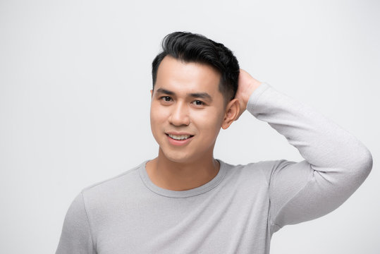 Young Handsome Attractive Asian Man With Clean Radiant Face For Male Beauty And Skin Care Concepts