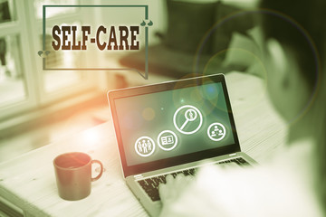 Text sign showing Self Care. Business photo showcasing the practice of taking action to improve one...
