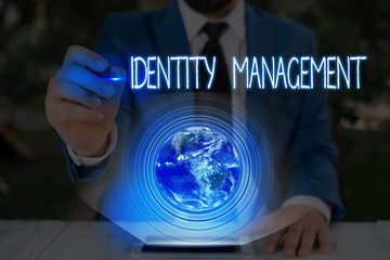 Conceptual hand writing showing Identity Management. Concept meaning administration of individual identities within a system Elements of this image furnished by NASA