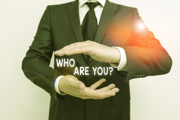 Handwriting text writing Who Are You Question. Conceptual photo asking about someone identity or...