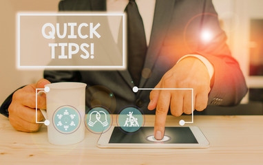Writing note showing Quick Tips. Business concept for small but particularly useful piece of...
