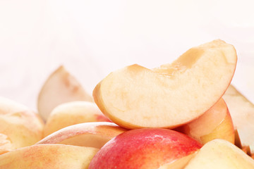 Fresh red apple fruit slice isolated on blur background