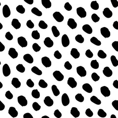 Seamless pattern with blob strokes made by hand with ink and brush. Doodle style.  Black particles isolated on white backgorund. Repeatable. Use it for backdrop, wrapping paper, textile design