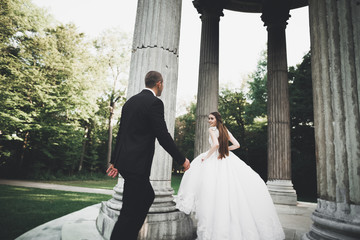 Obraz premium Sensual portrait of a young wedding couple. Outdoor