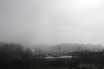 A view of Bregenz city in fog, taken from the famous Lake Stage (Seebuehne) theater in Vorarlberg, Austria.