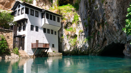 Dervish House or Blagaj Tekija on Buna river. The building is a Dervish monastery outside Mostar city and nearly 600 years old - Blagaj, Mostar - Bosnia and Herzegovina