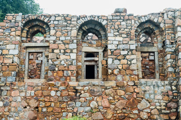 Ruin of three doors or windows from north wing of Firoz Shah Tomb at Hauz Khas Tank