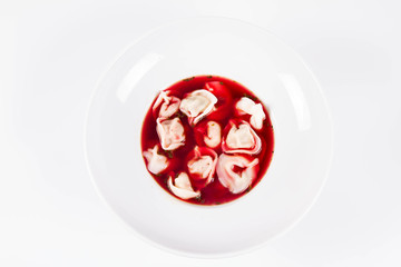 Polish Christmas Eve dish:clear borscht with dumplings (uszka)