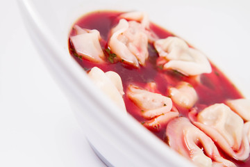 Polish Christmas Eve dish:clear borscht with dumplings (uszka)