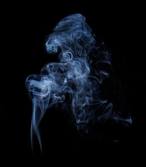 Photo of real white smoke on black background