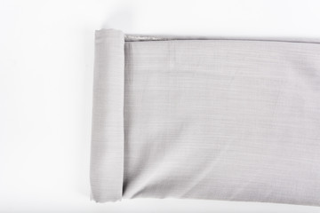 Neutral gray cotton and hemp cloth under white background