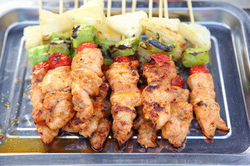 Pork Barbecue with Ketchup in a Thai market , Thai traditional style