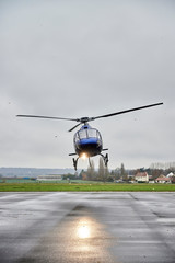 Landing blue Helicopter