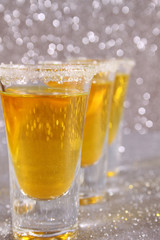Glasses with a yellow cocktail