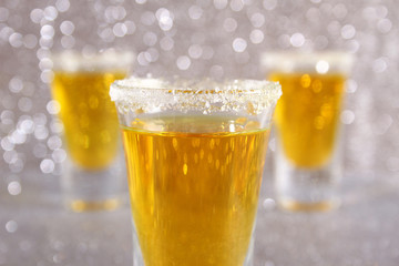 Glasses with a yellow cocktail