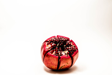 Pomegranate isolated at the white background