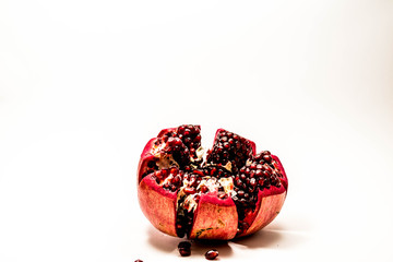 Pomegranate isolated at the white background