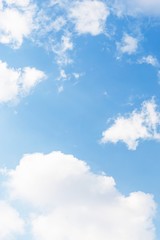 Blue sky background. Blue sky with fluffy white clouds