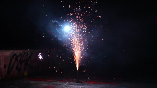 Big firework fountain sparkles and shooting fire