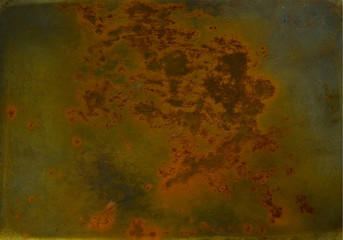 Texture. Fragment of an old sheet of metal covered with blue-green mold, spots of rust and a layer of water. Close-up.