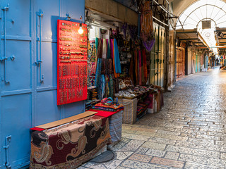 Small shop with souvenirs and fabrics on the David street near to Jaffa Gate in the Old City in Jerusalem, Israel