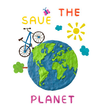 Plasticine bicycle on planet Earth with Save the planet text isolated on white background. Ecological concept