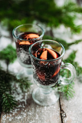 Mulled red wine on the rustic background. Selective focus. Shallow depth of field.