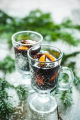 Mulled red wine on the rustic background. Selective focus. Shallow depth of field.