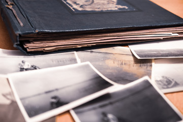 Old watch and photos, family ancestry, memories concept 
