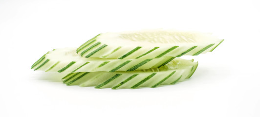 Close up cucumber slices isolated on white background