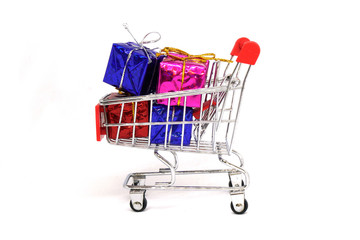 Shopping Cart and presents gift box isolated white background - Shopping stores to buy xmas goods concept 