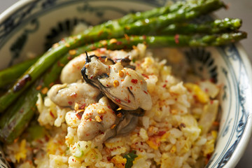 Fried rice with oyster and asparagus 