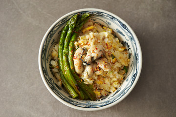 Fried rice with oyster and asparagus 