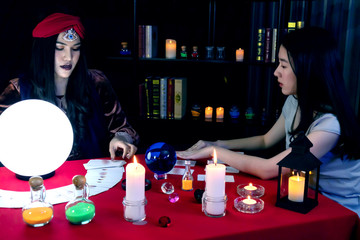 Fortune teller, astrology, prediction, forecast the future to female customers In beliefs, life,...