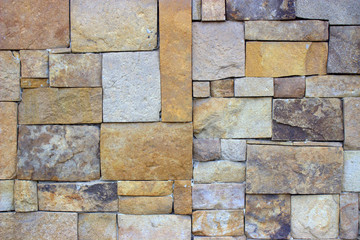  Stone masonry. The stones of different colors and sizes are tightly fitted.