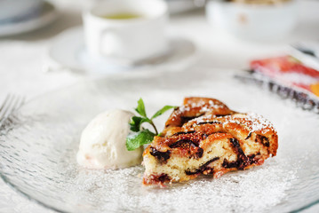plum cake with mint and ice cream