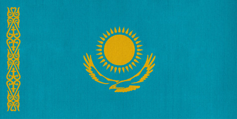 National flag of Kazakhstan on a cotton texture background