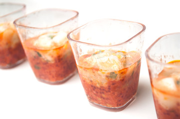 Closeup of mini appetizers in a little glasses