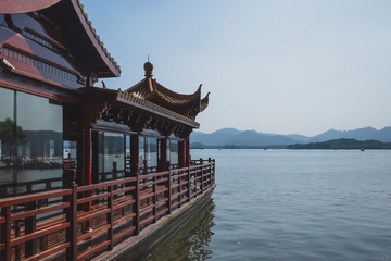 Boat and landscape of West Lake in Hangzhou, China