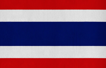 National flag of Thailand on a cotton texture background