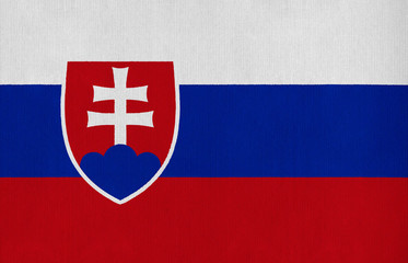National flag of Slovakia on a cotton texture background