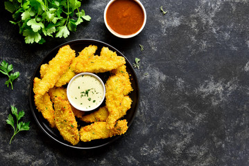 Crispy fried breaded chicken breast strips