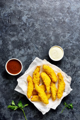 Crispy fried breaded chicken breast strips